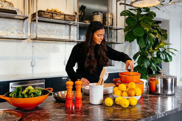 person in kitchen with storaging